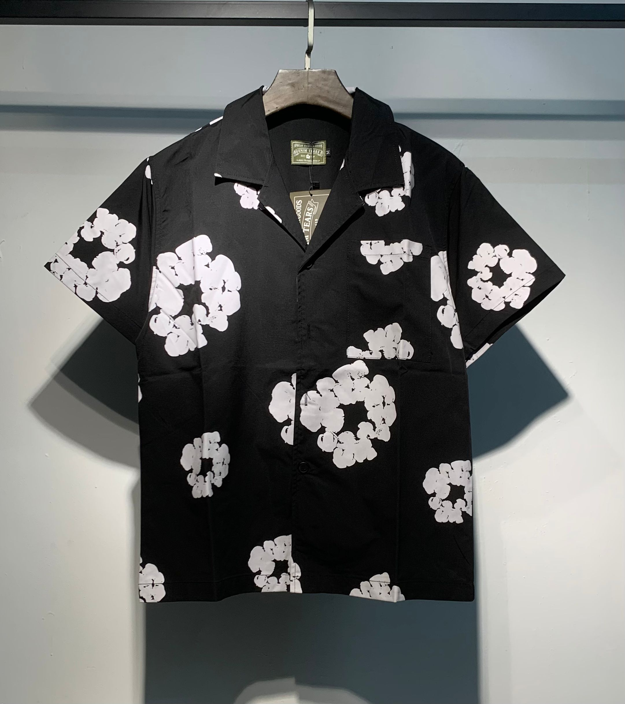 Denim Tears The Cotton Wreath Short Sleeve Suit Black T-shirt and shorts